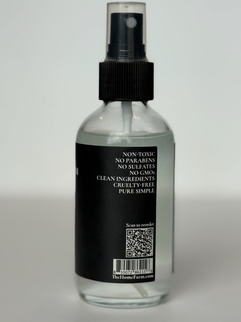 Dos du flacon vaporisateur du tonique à la rose avec la liste des ingrédients