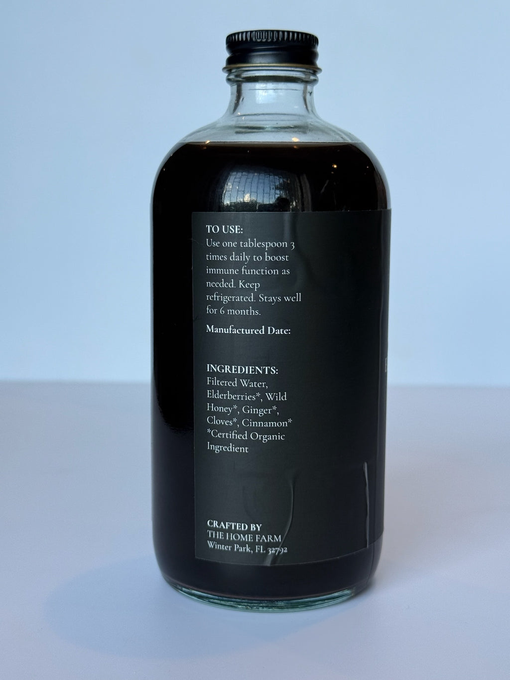 Étiquette de la bouteille de sirop de sureau avec les ingrédients