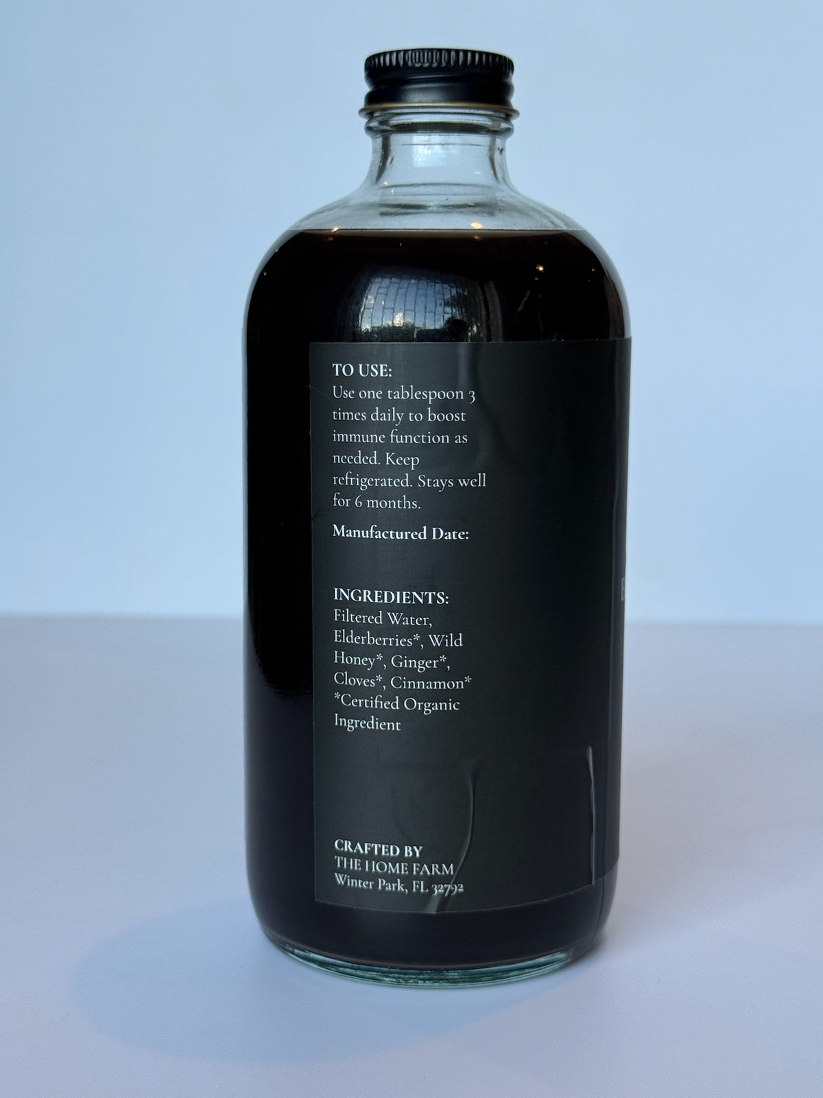 Étiquette de la bouteille de sirop de sureau avec les ingrédients
